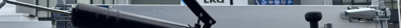 Hoe gebruik je een vetspuit bij een aanhanger?
